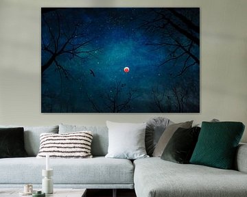 Mondfinsternis durch Bäume gesehen