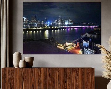 Views of the modern city one evening by Claude Laprise