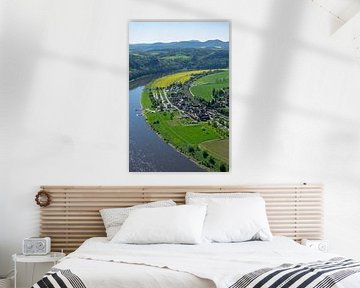 Aerial view of the rural village of Rathen in the Elbe Sandstone Mountains in eastern Germany with the river Elbe vertical by Animaflora PicsStock