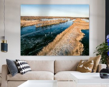 Schaatsen in de Weerribben-Wieden tijdens een koude winterdag van Sjoerd van der Wal Fotografie