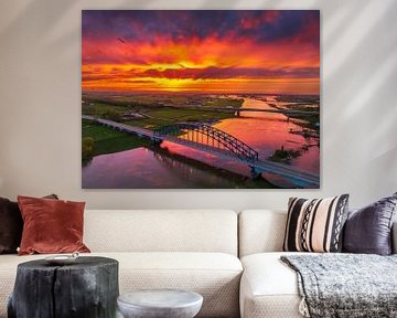 Brug over de IJssel in een kleurrijke zonsondergang van Sjoerd van der Wal Fotografie