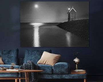 Harbour entrance of Volendam at moonlight in black and white by Chris Snoek
