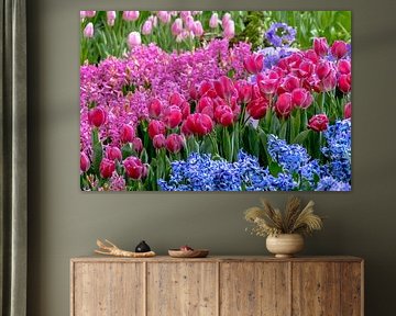 Spring meadow with red tulips and hyacinths by Dieter Meyer