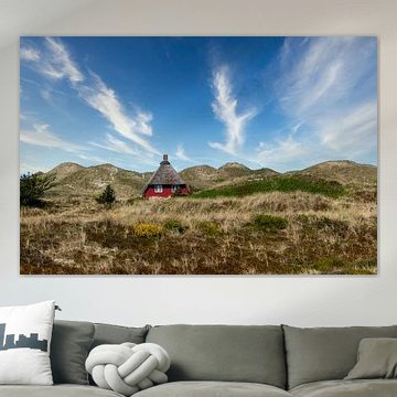 Houten huisje in de duinen van Nymindegab