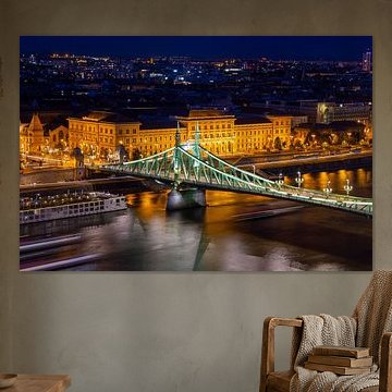 Evening panorama of Budapest with the Danube and the Liberty Bridge in the foreground