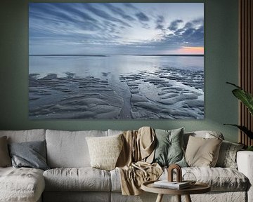 Zonsondergang bij opkomend water