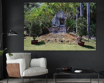 Buddha carved in sacred stone by Frank Photos