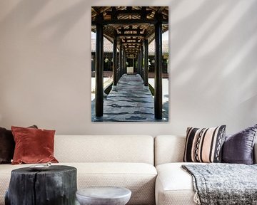 The traditional wooden passageway of a pagoda by Frank Photos