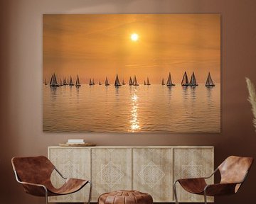 Sailing race on the IJsselmeer and sunset by Harrie Muis