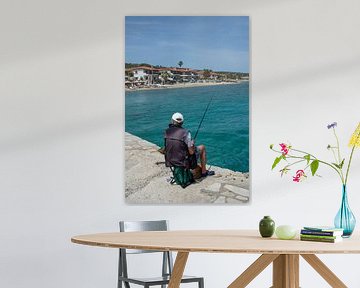 Man fishing vertically on the pier on the Mediterranean Sea by Animaflora PicsStock