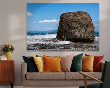 Waves breaking on rocks in the Mediterranean with turquoise-coloured water by Animaflora PicsStock