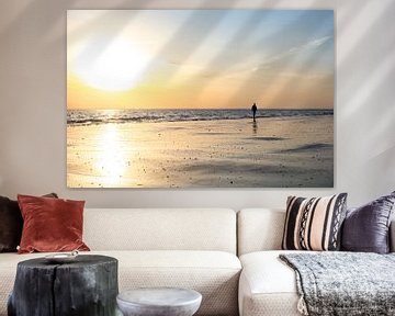 Beach walker with setting sun by Marika Rentier
