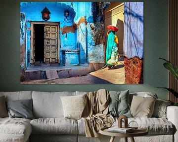 Indian woman in picturesque colourful street in Bundi by Marco Rutten
