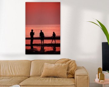 Silhouetten met zonsondergang by Peter Schütte