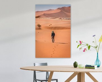 Footsteps in the sand dunes of Sossusvlei, Namibia by Opmeer Reports