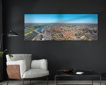 Lucht panorama van de historische stad Deventer aan de IJssel  met de Wilhelmina brug in Nederland van Eye on You