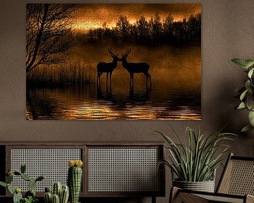 Deer at orange sunrise