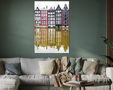 Huizen langs het Damrak in Amsterdam