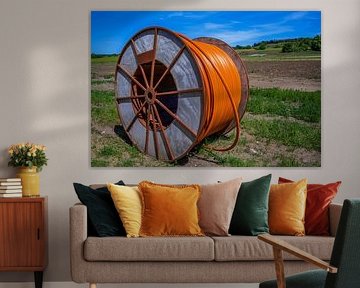 Kabeltrommel met oranje glasvezelkabel