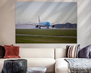 KLM aircraft braves rain on Polderbaan