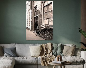 Dutch bicycle parked in Amsterdam, in sepia by Heleen van de Ven