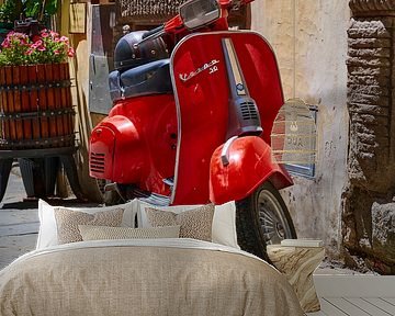 Red Vespa scooter in Cortona by Jenco van Zalk