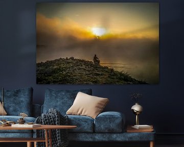 Fisherman on the river IJssel as the sun rises by Gerard Boerkamp