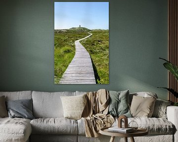 Holzweg zum Leuchtturm bei klarem Himmel von Alexander Baumann