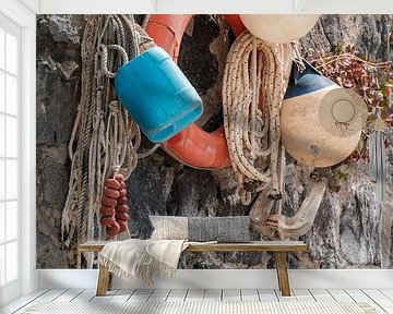 Lifebuoy, buoys and ropes in the harbour of Marina di Corricella, Procida by Melissa Peltenburg