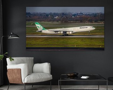 Mahan Air Airbus A340-300 passenger jet. by Jaap van den Berg