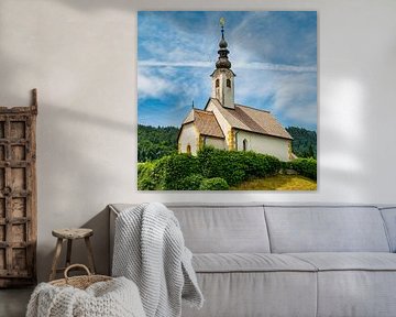 A view of the churches of Maria Woerth on Lake Woerthersee in Austria. by Andreas Völkel