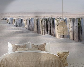 Breakwaters disappear into the beach by Marjolijn van den Berg