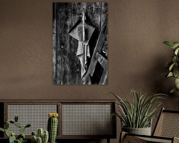 Dustpan and brush, towel and ladder against a wooden wall. van JRobert Photography