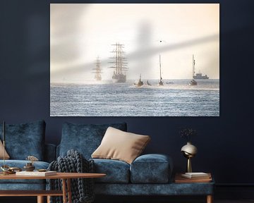 Side ships slowly disappear on the horizon after Sail.