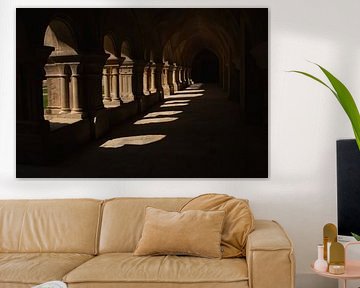 The play of light and shadow between the columns of Fontenay Abbey (Burgundy, France)