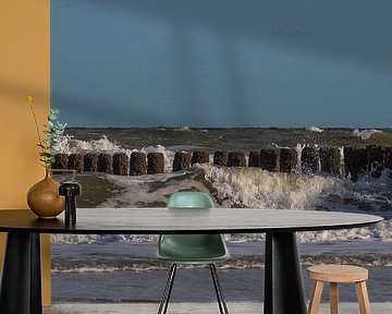 A wave overturns at breakwaters on the coast of Zeeland by Marjolijn van den Berg