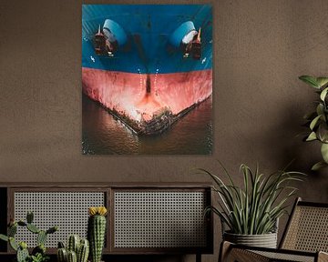 A seagoing vessel is moored in the lock by scheepskijkerhavenfotografie