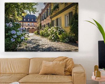 Flower-lined old town alley in Frankfurt-Höchst