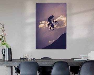 Boundless heights - BMX jump in front of a dramatic sky