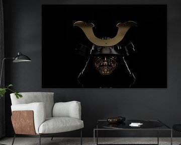 Ancient samurai helmet with maedate decoration in subdued light