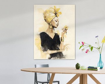 Elegante Afrikaanse vrouw in zwart en goud met bloem en sierlijke hoofddoek