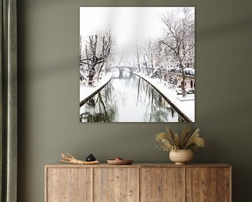 Winter in Utrecht. Besneeuwde werven aan de Oudegracht. van André Blom Fotografie Utrecht