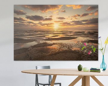 Sonnenuntergang über dem Wattenmeer bei Koehool