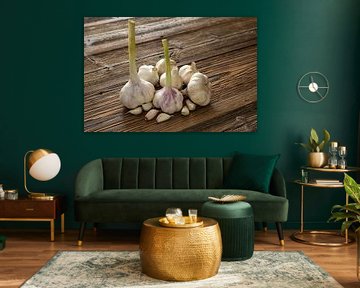 Garlic cloves stylised on weathered wooden boards by Photo Art Thomas Klee
