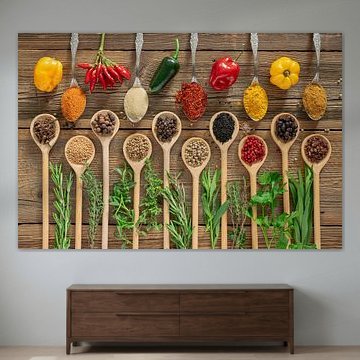 Fresh chilli, spices and herbs on wood
