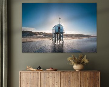 Drowning house on Terschelling beach in backlight by Marjan Schmit Visser