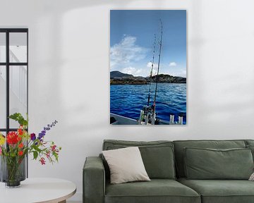 Fishing rod in front of the West Cape in the Norwegian fjord landscape. Scandinavia by Martin Köbsch