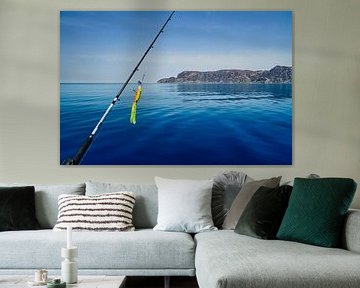 Fishing rod in front of the West Cape in the Norwegian fjord landscape. Scandinavia by Martin Köbsch