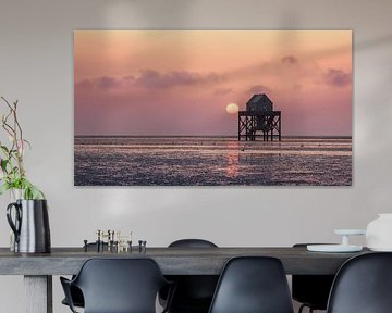 The setting sun at "The Kalkman" on the Engelsmanplaat in the Wadden Sea by Marga Vroom