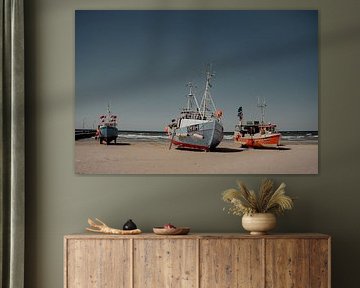 Fishing boats on the beach in Denmark by Fabian Krebs